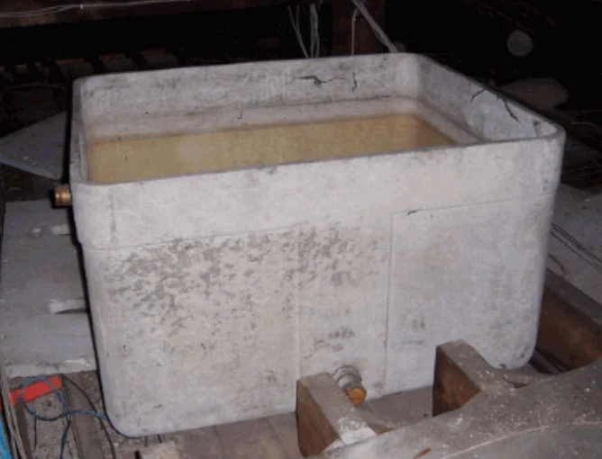 Asbestos cement water tank in loft space identified during survey